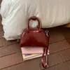 Bolsa Pillow de Design Nicho para Mulheres 2026 Novo Modelo Bolsa de Mão de Luxo Leve Bolsa de Ombro Transversal Estilo Coreano Casual com um Toque de Alta Qualidade