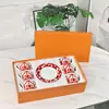 Conjunto de Porcelana Óssea Vermelha Chinesa Janela de Ferro Espanhola Xícara de Café e Pires Porcelana Óssea Vermelha Chinesa Seis Xícaras e Seis Pires Atacado Transfronteiriço