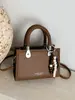 Bolso de Mano Cuadrado Pequeño Más Vendido Transfronterizo para Mujer 2026 Nuevo Retro Versátil Bolso Cruzado Moda de Nicho Súper Popular Bolso para el Trabajo