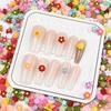 Accesorios para uñas con pequeñas flores de resina, populares para comercio exterior, 6 mm, mini flores frescas pastorales, paquete de material para decoración de uñas DIY