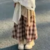 Conjunto Boho para Niñas Colección Otoño 2026 para Niños Medianos y Mayores Suéter Calado Desgastado Falda a Cuadros Irregular