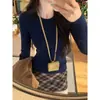 Suéter deslumbrantemente hermoso con cuello redondo calado, camiseta base tejida para mujer, nuevo top interior ajustado para el invierno de 2026