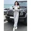 Conjunto casual de sportswear feminino 2026 novo estilo outono moletom cinza moderno e jovem calça pantalona conjunto de duas peças