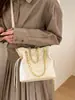 Bolso de mano de moda transfronterizo para mujer 2026 otoño nuevo estilo moderno bolso cubo de cadena de rombos bolso cruzado casual para el trabajo