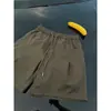 Shorts Casuales de Corte Diagonal Estilo Americano Color Verde Militar para Hombres y Mujeres, Nuevos Pantalones Deportivos de Trabajo de Verano, Shorts Rectos de Corte Holgado de Cinco Puntos