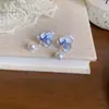 Aretes franceses retro de flor azul perla para mujer, primavera, temperamento suave, aretes de alta gama, aretes nuevos 2025