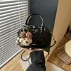 Bolso bordado de nicho súper popular para mujer, nuevo bolso cruzado versátil de moda 2026, bolso de mano exquisito, bolso cojín, bolso cuadrado pequeño