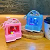 Llavero Creativo de Dibujos Animados Máquina de Garra Brillante Atrapador de Bolas Juguete para Aliviar el Estrés Colgante Regalo Venta al por Mayor
