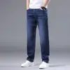Calça Jeans Lavada Azul de Alta Qualidade Transfronteiriça Masculina Nova para Primavera e Outono Jeans Reto Solto Casual Elástico Calça Longa Meninos
