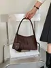 Bolso tejido con patrón transfronterizo para mujer, nuevo bolso tipo cubo de gran capacidad, bolso de hombro versátil y moderno para llevar debajo del brazo