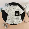 Traje de Verano para Niños Estampado Completo de Estrellas Manga Corta 2026 Nuevo Conjunto de Dos Piezas Estilo Verano para Niños Ropa Casual para Bebé