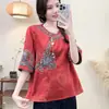 Camiseta de Satén Estilo Étnico 2026 Verano Nuevo Estilo Camisa Pulóver de Cuello Diagonal Color Sólido Bordado Jacquard Cuello Redondo Manga Corta