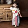 Playeras estampadas de manga corta para niños 2026 Primavera y Verano Nuevo Estilo Coreano Ropa para niños Moda para niñas Camisetas Ins Trajes Casuales