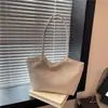 Bolso de Mano con Patrón Tejido de Diseño Nicho 2025 Nuevo Bolso de Hombro Retro para Mujer Color Puro Textura Simple Bolso de Axila