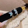 Anillo abierto estilo ins azul claro floral de circón, mariposa, chica de primavera, nicho, apilable, anillo de dedo de alta gama