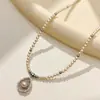 Colar de Pérolas com Pingente Vazado em Forma de Gota de Água de Luxo Leve de Alta Qualidade, Corrente de Clavícula Elegante e Versátil para o Dia a Dia