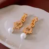 Pendientes de Borla de Perla con Herradura de Circonita Plateada Clavos de Oreja Exagerados Retro de Gama Alta Accesorios para Orejas de Nicho Lujo Ligero Venta al por Mayor Mujeres