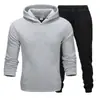 Conjunto de sudadera de color liso de talla grande para hombre y mujer, 220 g de tela, fabricante mayorista, conjunto holgado de talla grande de marca de moda para parejas