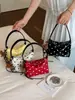 Shuai Mijia 2026 Verano Nueva Moda Ligero Elegante Casual Lunares Nicho Simple Hombro Cruzado Bolso de Mano