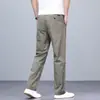 2026 Primavera Hombres Vintage Lavado Algodón Puro Elástico Casual Simple Versátil Pantalones Casuales para Hombre Venta al por Mayor