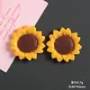 Pequeña margarita girasol girasol resina accesorios pegamento crema diy dijes Crocs pegatinas refrigerador accesorios para el cabello decoraciones