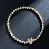 Pulsera elástica para mujer Amazon Transfronteriza Moda Letra Simple Cobre Incrustado con Circonita y Cuentas Uvccb