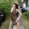 Conjunto feminino de verão, novo design, nicho, sem mangas, justo, com amarração no pescoço e calça pantalona