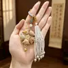 Producto Terminado Puro Hecho a Mano Patrimonio Cultural Inmaterial Brocado de Canción Retro Chino Nuevo Colgante de Orquídea Linghua Doble Cara Retro Sensación de Alta Gama Borla