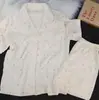 Atacado transfronteiriço de novos pijamas de algodão nuvem para mulheres, populares no verão, conjunto fofo de roupas caseiras com shorts de manga curta e desenhos animados