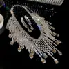 Aretes y collar de dos piezas con colgante de flor y gota de agua incrustados con diamantes, cadena para la clavícula de moda y exquisita, joyería de lujo ligero y de alta gama para mujer