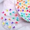 Decoraciones de Arte de Uñas de Polka Dot y Mariposas Nuevas Versátiles de Verano Mariposas Pequeñas 3D de Color Sólido Uñas Portátiles Pendientes Accesorios de Resina