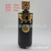 Botella de Vino con Glaseado en Spray 500ml Botella de Licor Personalizada Fabricante de Botellas de Vidrio de Yuncheng Produce Botella de Vino Cilíndrica con Flor Asada