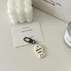 Hebilla de puerta de resina 788 pez gato personalidad creativa regalo llavero colgante de bolso colgante de pareja joyería para estudiantes