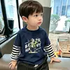 Camiseta de manga larga para niño, nuevo modelo primavera y otoño 2026, camiseta básica holgada para niños, top a rayas para niños, otoño
