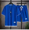 Camiseta Waffle Estilo Hong Kong Traje de Dos Piezas Falso para Hombre Pareja Suelto Moderno Talla Grande Pantalones Cinco Puntos Casual para Exterior