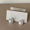 Brincos de Metal com Strass de Oito Estrelas Escovados Estilo Levemente Luxuoso e de Alta Qualidade para Mulheres, Brincos da Moda Tendência de Nicho para Mulheres