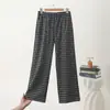Nuevos pantalones anchos de otoño e invierno para mujer, con corte holgado, forro polar y un diseño casual a cuadros, que proporcionan calidez, protección contra el frío y un efecto adelgazante, perfectos para ropa de estar por casa.