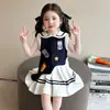 Vestido de Verano para Niña 2026 Versión Coreana Vestido Polo de Dibujos Animados tipo Camiseta Vestido Plegado Estilo Universitario para Niña Estilo Moderno