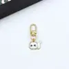 Colgante de gatito de aleación estilo japonés Llavero de coche mini Colgante para AirPods Accesorio para bolso pequeño Regalo
