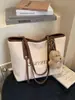 Bolso de Paja Tejida para Vacaciones en la Playa para Mujeres 2025 Nuevo Popular de Gran Capacidad Bolso de Hombro Moderno Bolso Tote de Moda para el Trabajo