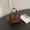 Bolso de gamuza para mujer, nuevo estilo 2026, color Melard de moda, adecuado para el trabajo, bolso tote pequeño, bolso de hombro, bolso cruzado, bolso tipo cubo