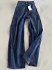 Modelo nuevo estilo coreano primavera/otoño 2026, populares este año, jeans de pierna ancha sueltos de talle alto retro, azul oscuro, curvos