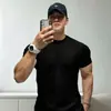 Camiseta deportiva de manga corta de algodón puro de marca moderna para hombre, cuello redondo, ropa casual de entrenamiento para fitness, top transpirable, estilo americano para hombres jóvenes, verano