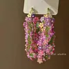 Brincos de flores coloridas 2025 Novas explosões Design de nicho Sense Temperamento avançado Brincos de personalidade exagerada exclusivos para mulheres