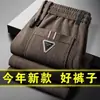 Pantalones casuales para hombre transfronterizos invierno más terciopelo grueso pana pantalones de hombre comercio exterior sueltos pierna recta pana pantalones deportivos