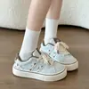 Zapatillas retro para mujer 2026 otoño nuevo súper populares zapatos blancos para estudiantes mocasines versátiles zapatos deportivos casuales de suela gruesa