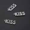 Moda europea y americana popular joyería accesorios metal galvanizado letras KISS Joyería incrustada de diamantes accesorios diy ventas directas de fábrica