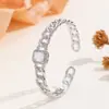 Pulsera de Uñas de Moda con Personalidad Europea y Americana para Mujer, Conjunto de Anillo y Pulsera de Hebilla de Cobre de Lujo Ligero con Incrustaciones Completas de Diamante en Forma de Corazón