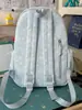 Mochila cielo estrellado azul brumoso suave, estilo coreano suave y linda, con un ambiente dulce y encantador, perfecta para salidas y sesiones de fotos