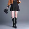 Moderna Falda plisada de ante y terciopelo para mujer 2026 Otoño/Invierno Nueva Falda corta simple de cintura alta Falda de línea A con temperamento para ir al trabajo